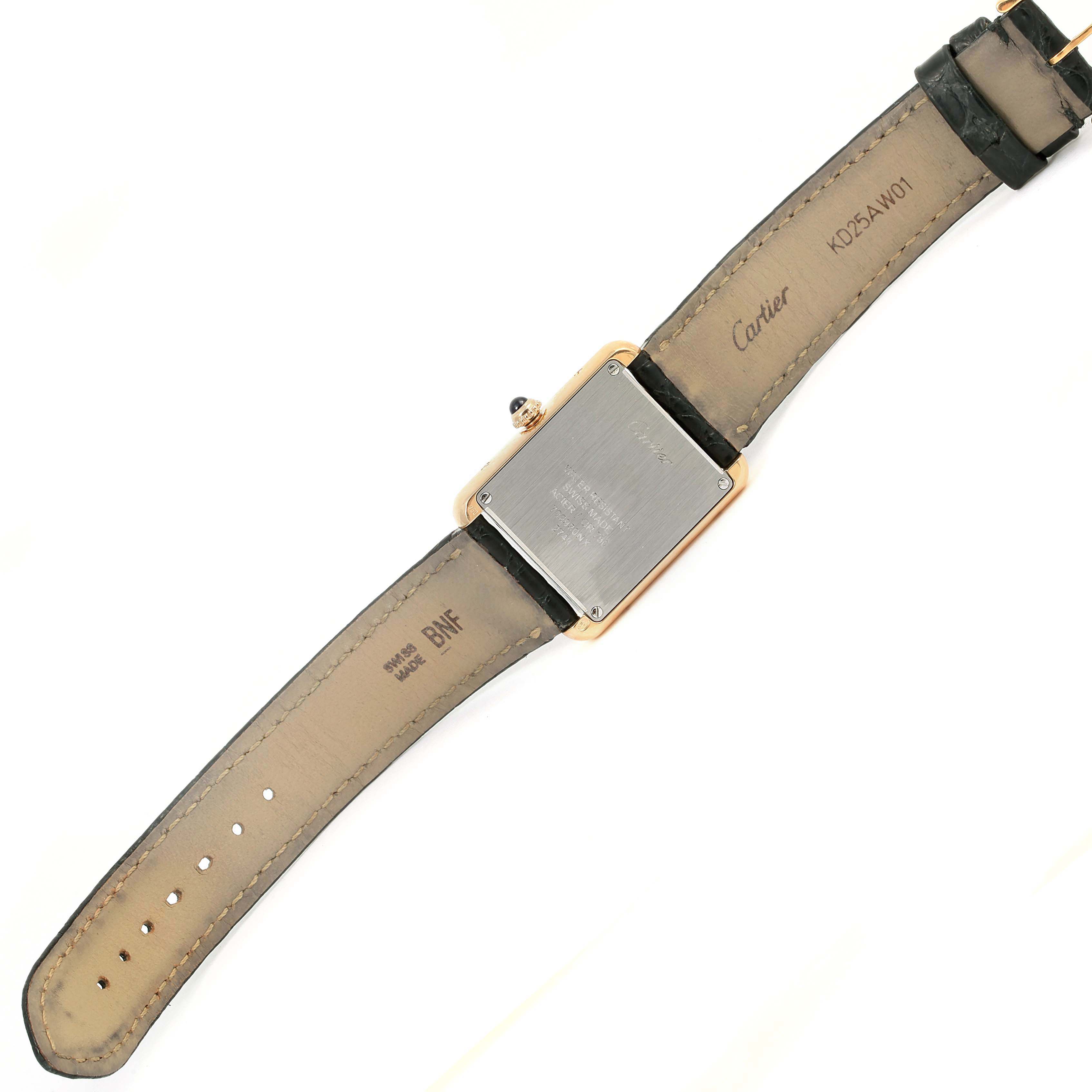 This image shows the back view of a Cartier Tank Solo W1018755 Women
s Steel and Gold (two tone) Silver Dial W1018755 Women
s Steel and Gold (two tone) Silver Dial watch, highlighting its case back and leather strap.