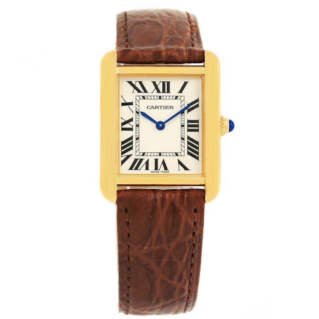 This is a front view of the Cartier Tank Solo W1018755 Women's Steel and Gold (two tone) Silver Dial W1018755 Women's Steel and Gold (two tone) Silver Dial watch, showing its face, rectangular gold case, and brown leather strap.