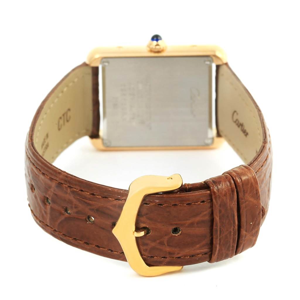 The image shows the back and strap of a Cartier Tank Solo W1018755 Women's Steel and Gold (two tone) Silver Dial W1018755 Women's Steel and Gold (two tone) Silver Dial watch, highlighting its buckle and case back.