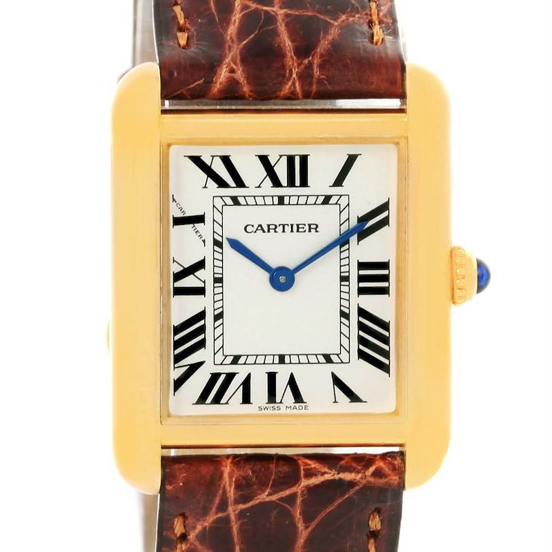 The image shows a front view of a Cartier Tank Solo watch, highlighting its rectangular face, Roman numerals, and leather strap.