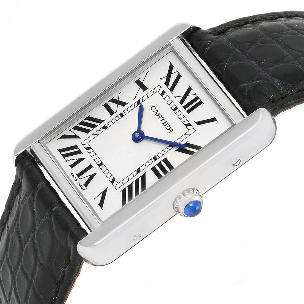 The image shows a Cartier Tank Solo W1018255 Women's Stainless Steel Silver Dial W1018255 Women's Stainless Steel Silver Dial watch at an angled view, highlighting its rectangular face, leather strap, and jeweled crown.