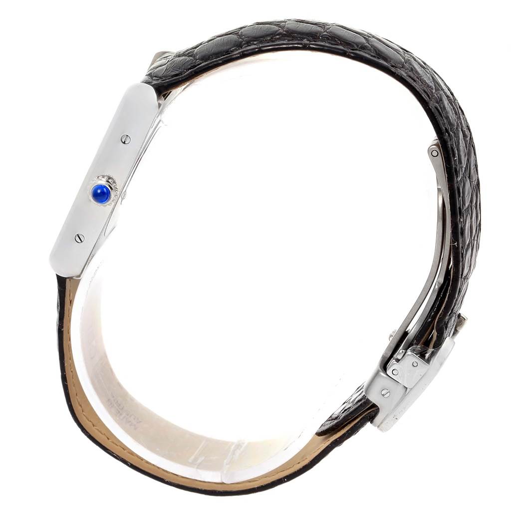 This image shows a side view of a Cartier Tank Solo W1018255 Women's Stainless Steel Silver Dial W1018255 Women's Stainless Steel Silver Dial watch, highlighting its crown and leather strap.