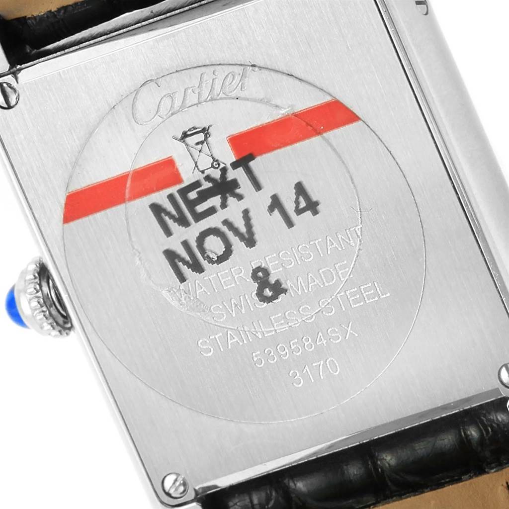 This image shows the back case of a Cartier Tank Solo W1018255 Women's Stainless Steel Silver Dial W1018255 Women's Stainless Steel Silver Dial watch, including its serial number and water resistance details.