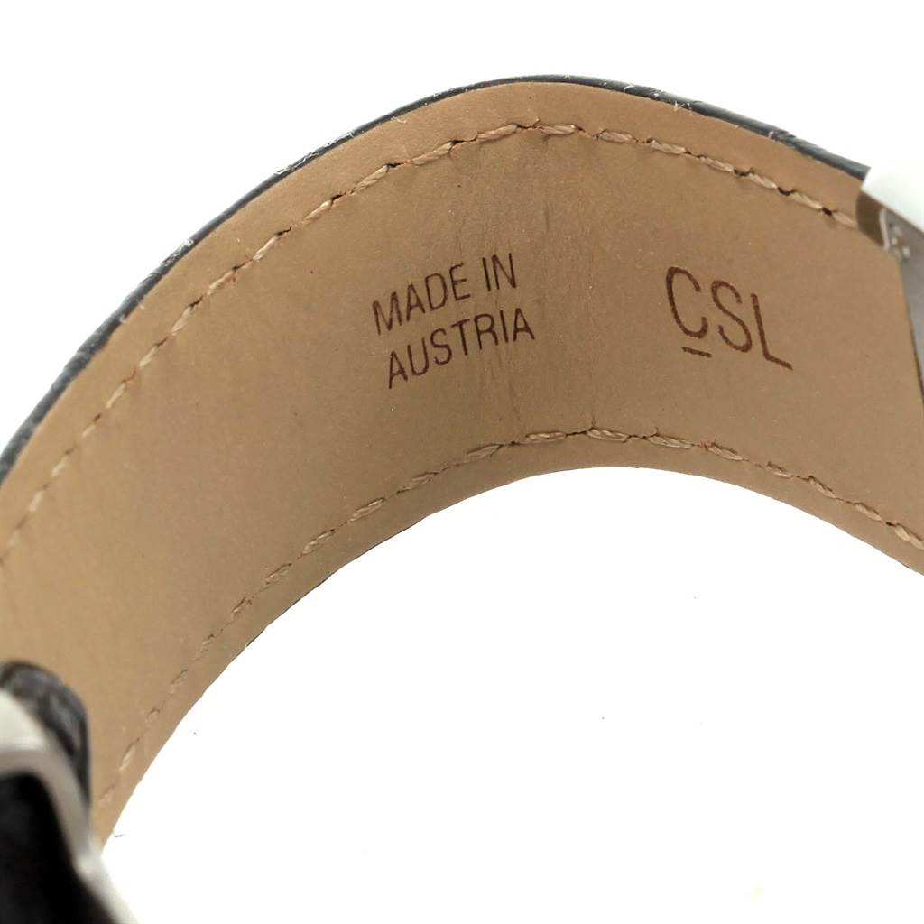 The image shows the inside of a leather strap for a Tank Solo model by Cartier, with "Made in Austria" text visible.