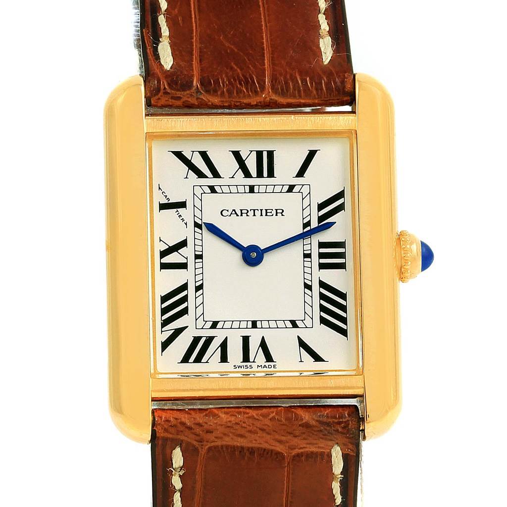 This image shows a front view of a Cartier Tank Solo W1018755 Women's Steel and Gold (two tone) Silver Dial W1018755 Women's Steel and Gold (two tone) Silver Dial watch, featuring its face, crown, and part of the leather strap.