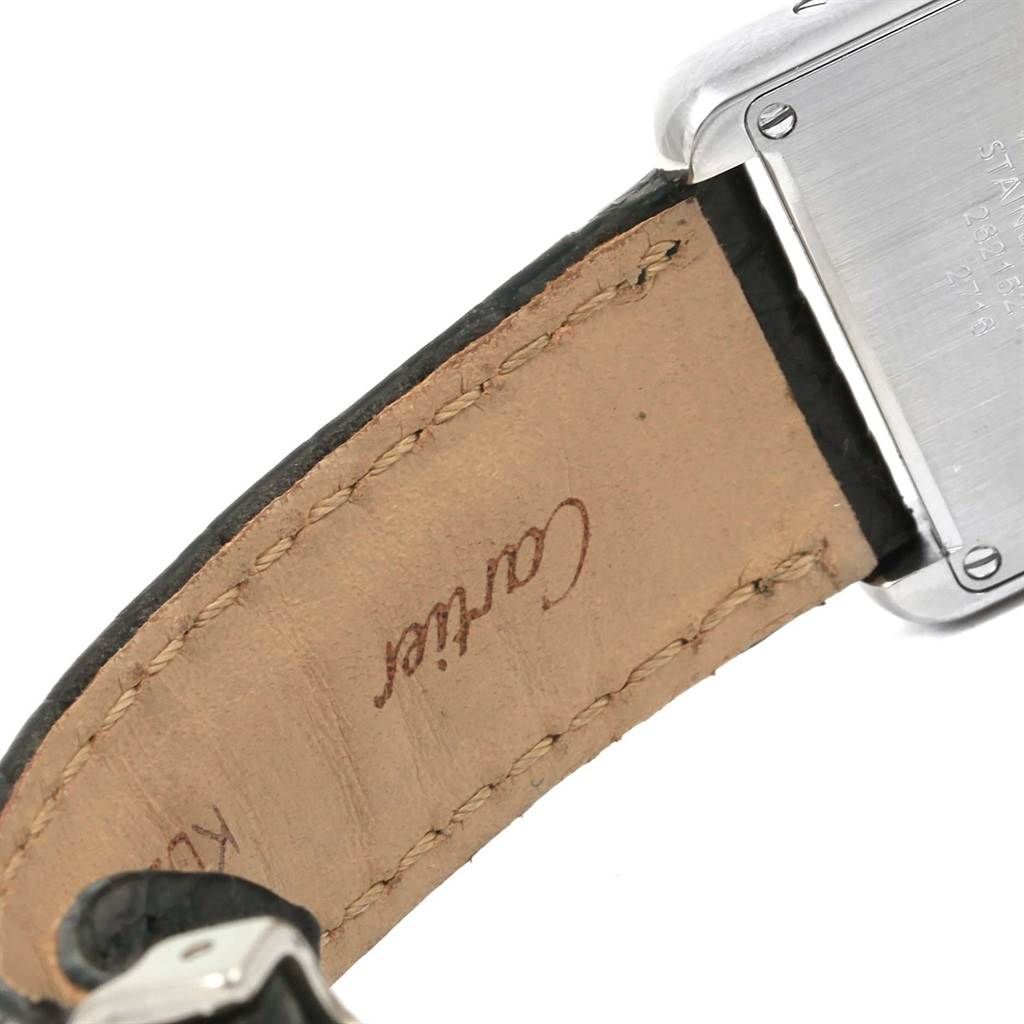 The image shows the back and inner leather strap of a Tank Solo watch by Cartier.