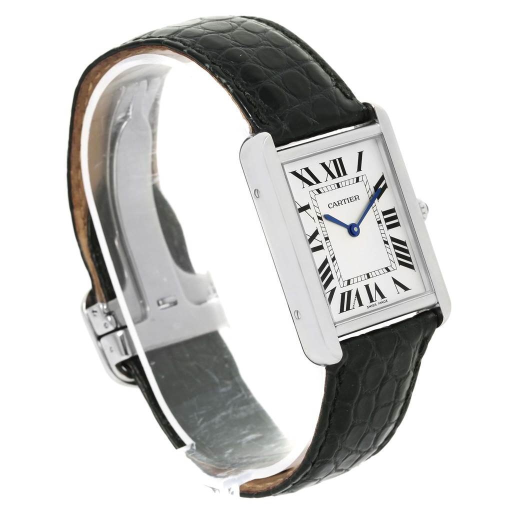 This image shows the Cartier Tank Solo W1018255 Women's Stainless Steel Silver Dial W1018255 Women's Stainless Steel Silver Dial watch from a side angle, featuring its rectangular case, Roman numeral dial, and leather strap.
