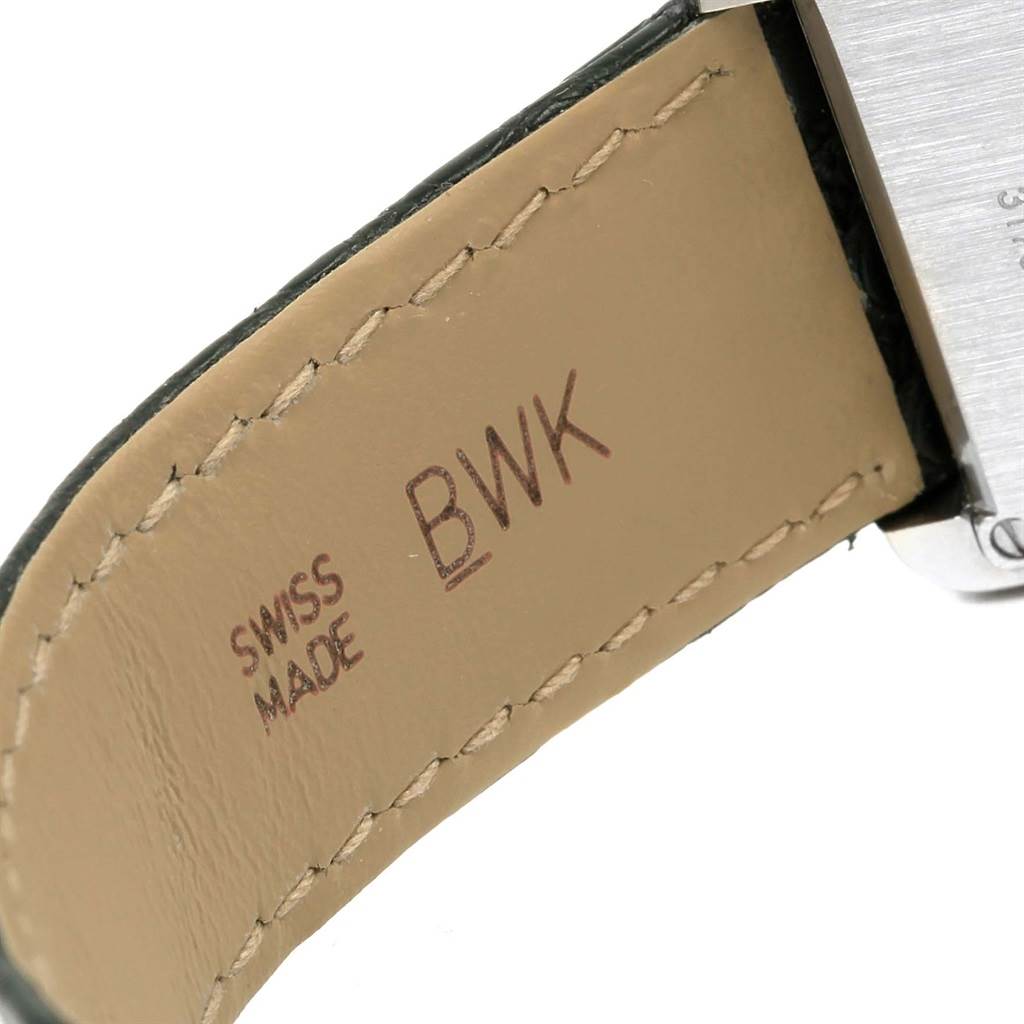 This image shows a close-up angle of the leather strap and a portion of the case back of a Tank Solo model watch by Cartier.