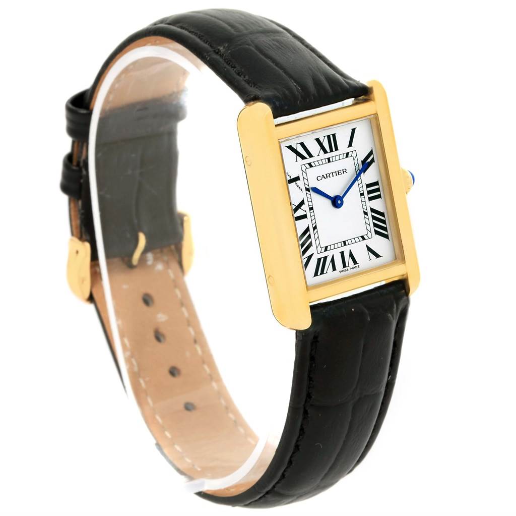 The Cartier Tank Solo W1018755 Women's Steel and Gold (two tone) Silver Dial W1018755 Women's Steel and Gold (two tone) Silver Dial watch is shown at a slight angle, highlighting the rectangular face, roman numerals, gold case, and black leather strap.