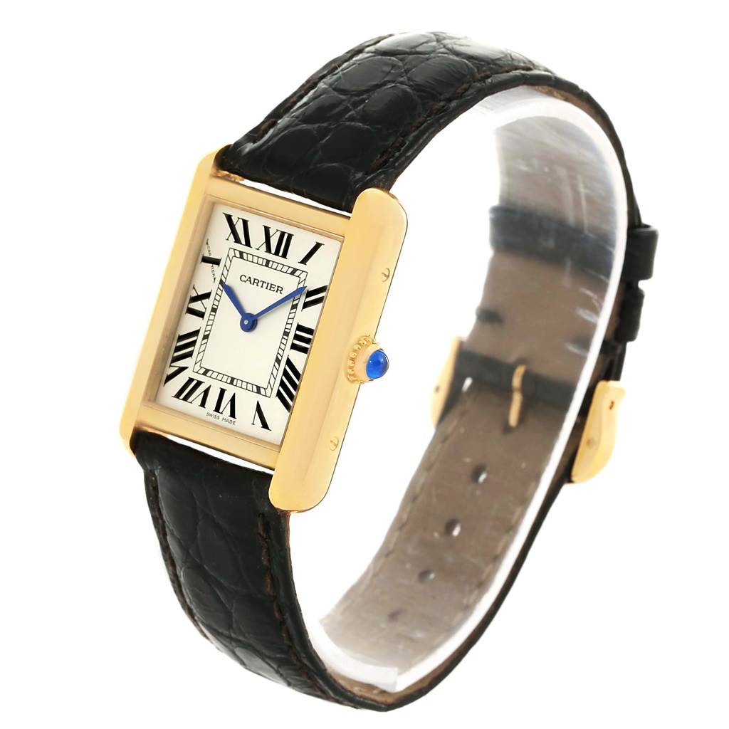 The image shows a Cartier Tank Solo W1018755 Women's Steel and Gold (two tone) Silver Dial W1018755 Women's Steel and Gold (two tone) Silver Dial watch at a slight angle, showcasing its rectangular face, Roman numerals, and black leather strap.