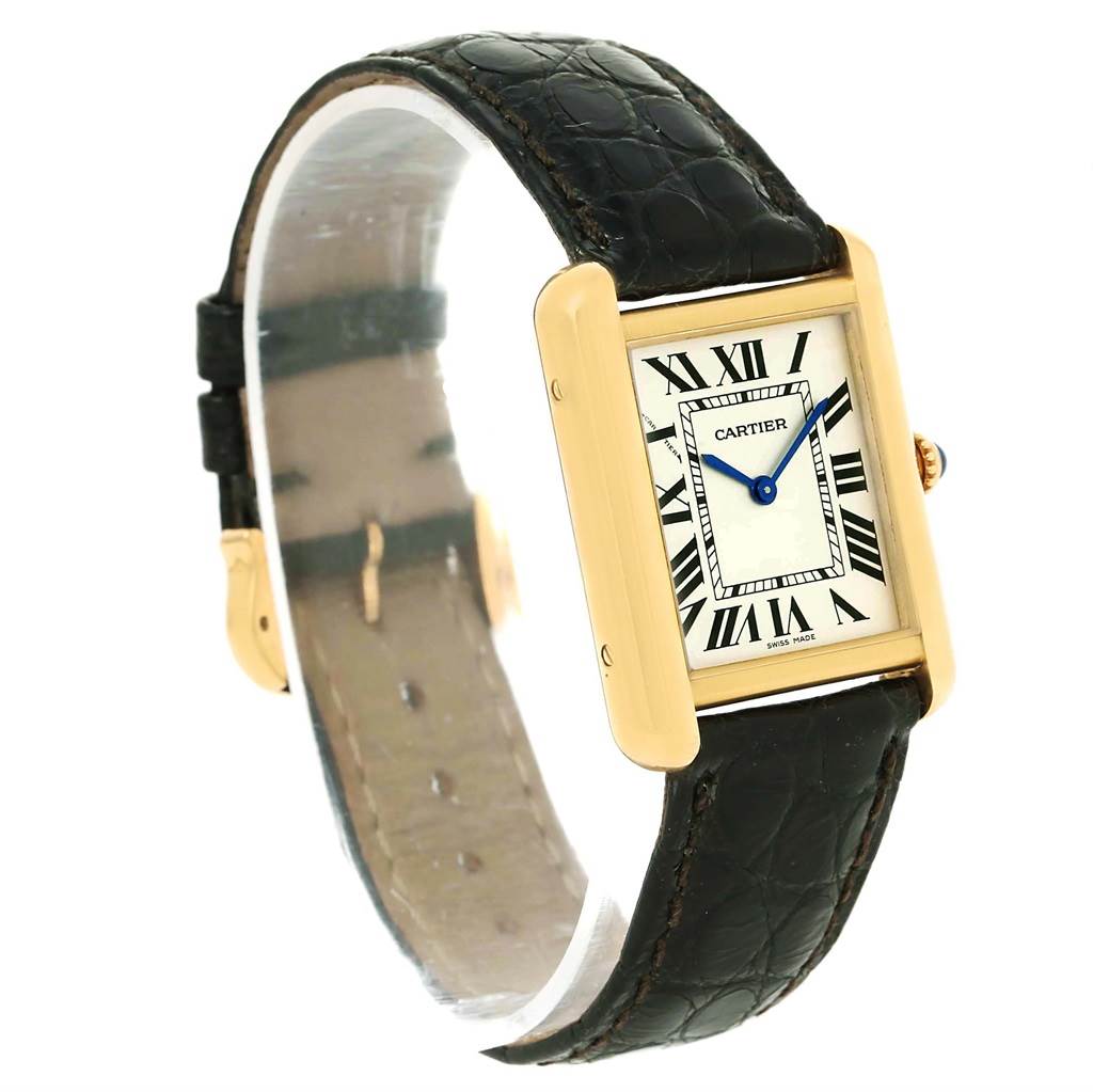 The image shows a side angle view of a Cartier Tank Solo W1018755 Women's Steel and Gold (two tone) Silver Dial W1018755 Women's Steel and Gold (two tone) Silver Dial watch, displaying its face, leather strap, and crown.