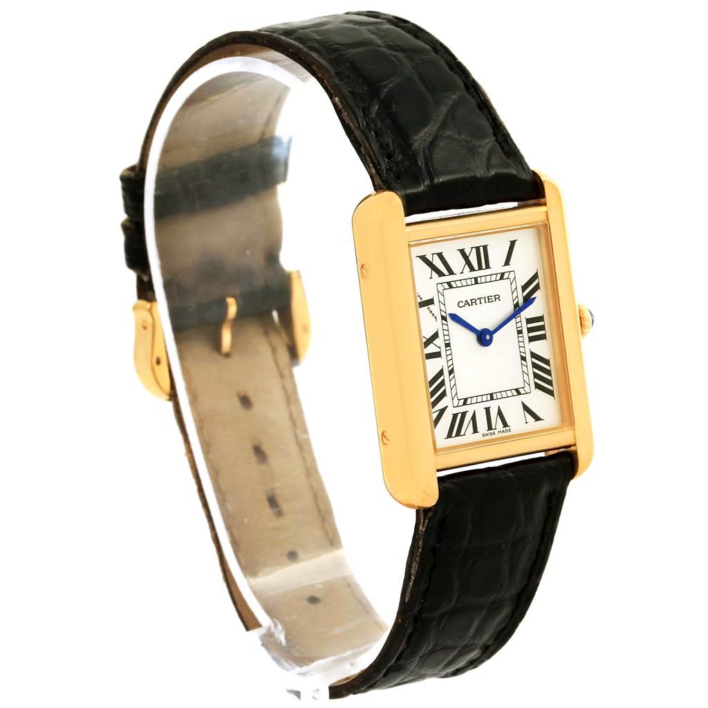 The Cartier Tank Solo W1018755 Women's Steel and Gold (two tone) Silver Dial W1018755 Women's Steel and Gold (two tone) Silver Dial watch is shown at a three-quarter angle, highlighting its face, case, black leather strap, and clasp.