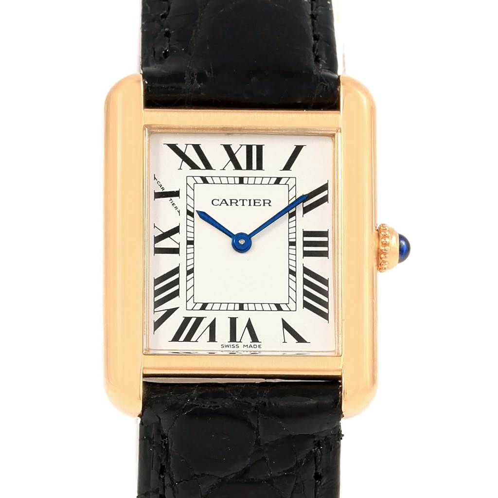 The image shows a Cartier Tank Solo W1018755 Women's Steel and Gold (two tone) Silver Dial W1018755 Women's Steel and Gold (two tone) Silver Dial watch head-on, featuring its rectangular face, Roman numerals, blue hands, and a black leather strap.