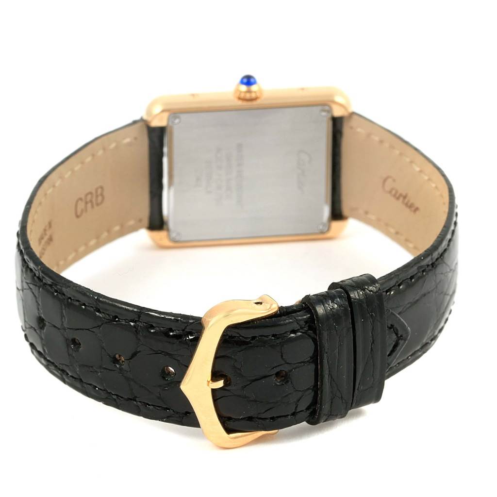 The image shows the back view of a Cartier Tank Solo W1018755 Women's Steel and Gold (two tone) Silver Dial W1018755 Women's Steel and Gold (two tone) Silver Dial watch, highlighting the leather strap and clasp.