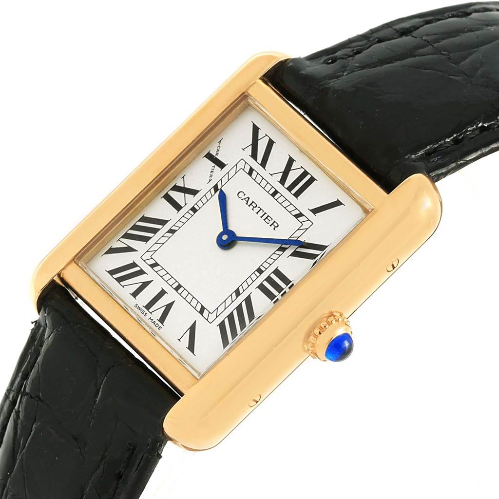 This image shows a Cartier Tank Solo W1018755 Women's Steel and Gold (two tone) Silver Dial W1018755 Women's Steel and Gold (two tone) Silver Dial watch from a top-down angle, displaying the face, case, crown, and part of the strap.