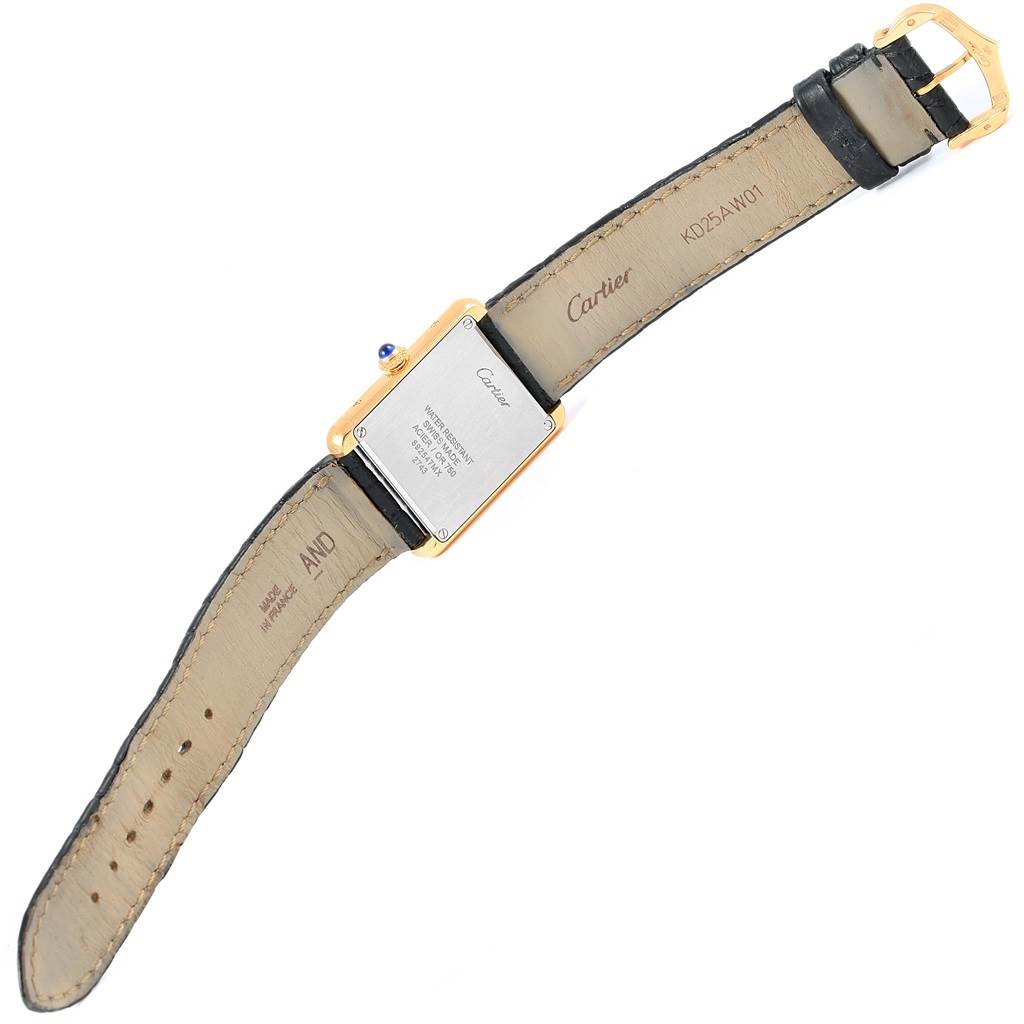 The image shows the back view of a Cartier Tank Solo W1018755 Women's Steel and Gold (two tone) Silver Dial W1018755 Women's Steel and Gold (two tone) Silver Dial watch, focusing on the case back and strap.