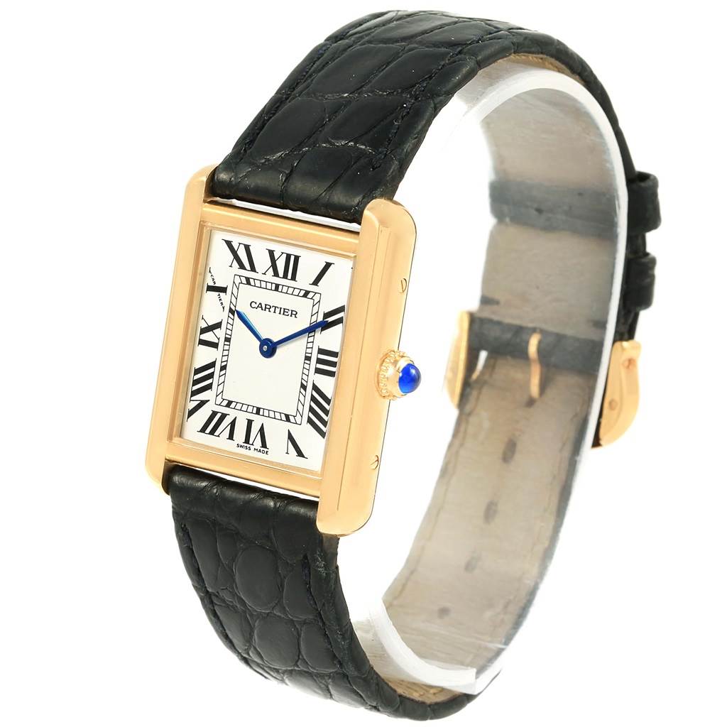 The image shows a Cartier Tank Solo W1018755 Women's Steel and Gold (two tone) Silver Dial W1018755 Women's Steel and Gold (two tone) Silver Dial watch from a front-side angle, highlighting the black leather strap and rectangular dial with Roman numerals.