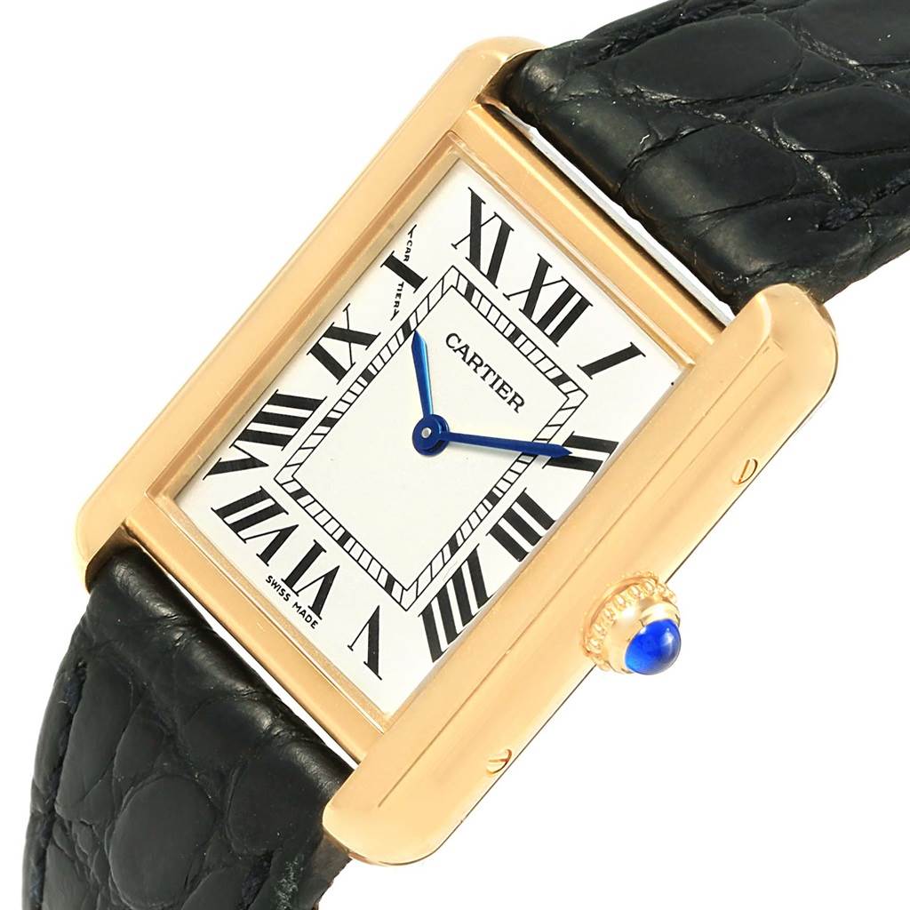 The image shows a Cartier Tank Solo W1018755 Women's Steel and Gold (two tone) Silver Dial W1018755 Women's Steel and Gold (two tone) Silver Dial watch angled to display its face, crown, and leather strap.