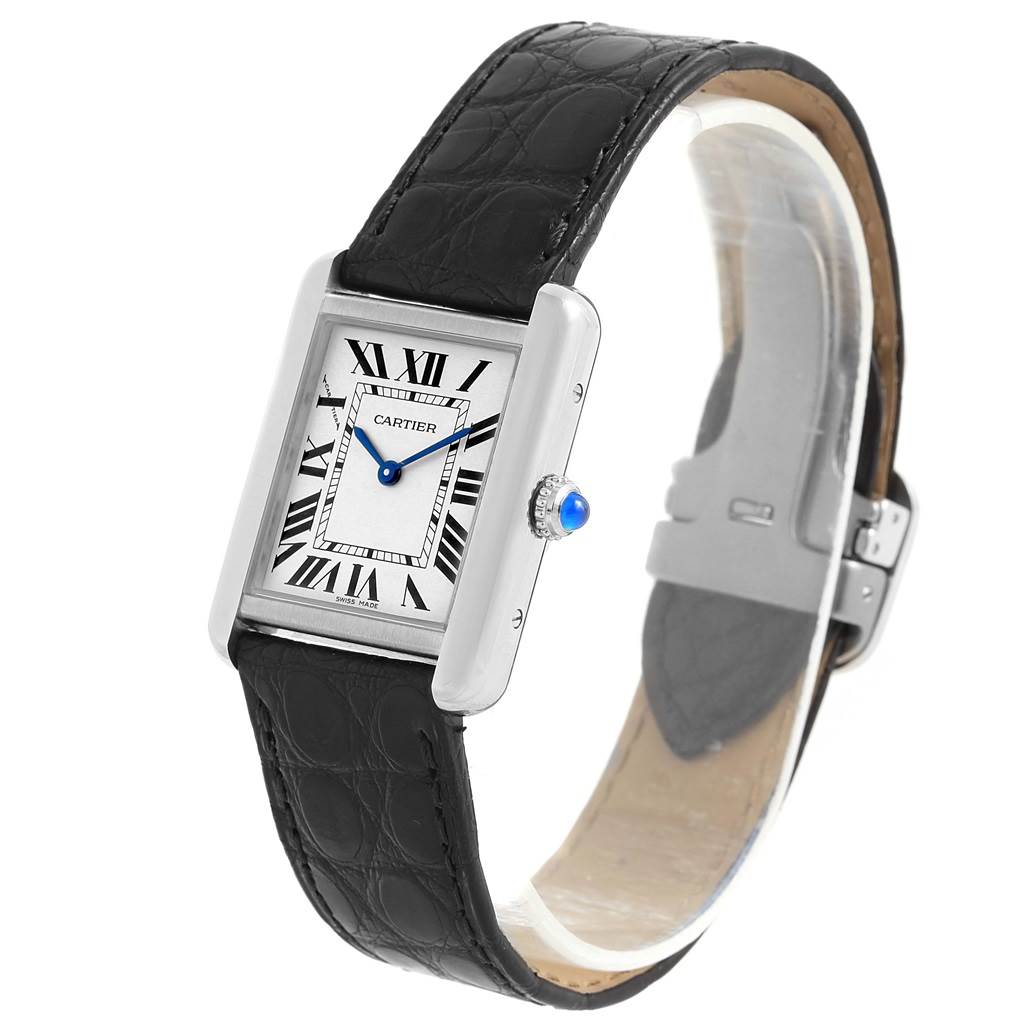 The Tank Solo by Cartier is shown at an angle displaying the face, crown, and black leather strap.