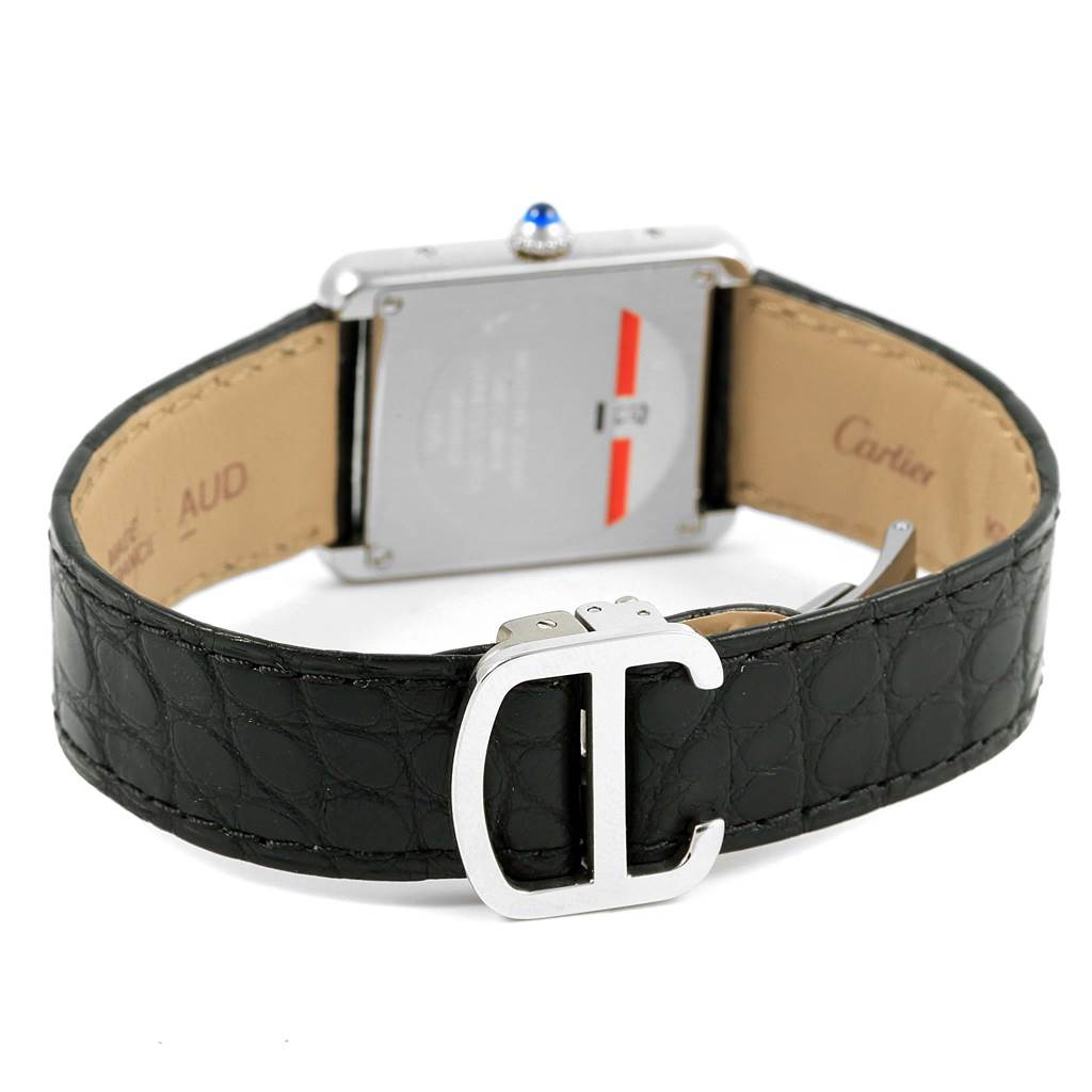 The image shows the back view of a Cartier Tank Solo W1018255 Women's Stainless Steel Silver Dial W1018255 Women's Stainless Steel Silver Dial watch, featuring the case back, black leather strap, and buckle.