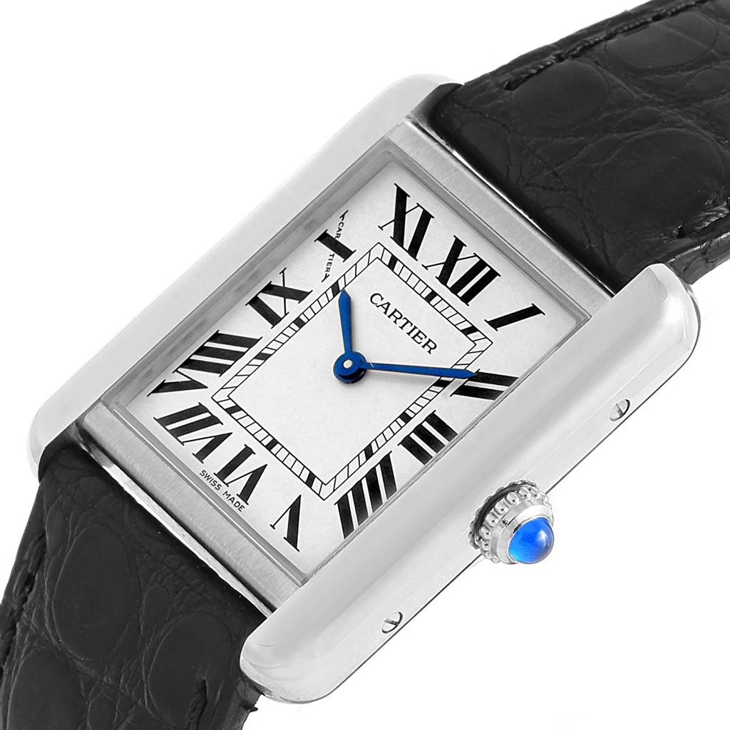The Cartier Tank Solo W1018255 Women's Stainless Steel Silver Dial W1018255 Women's Stainless Steel Silver Dial watch is shown from a slanted top-angle view, highlighting its dial, case, crown, and strap.