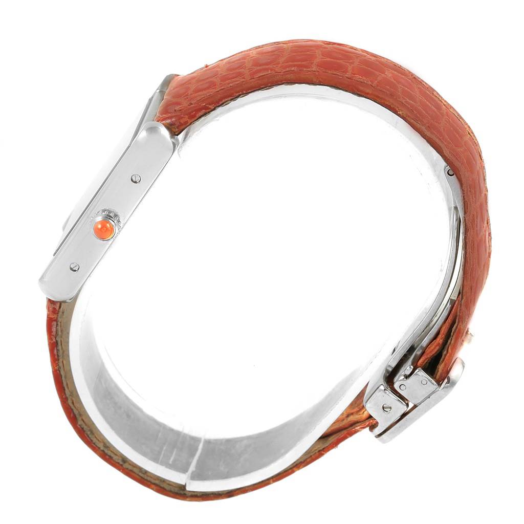This image shows a side angle of the Cartier Tank Solo W1019455 Women's Stainless Steel Orange Dial W1019455 Women's Stainless Steel Orange Dial watch, highlighting the strap and crown.