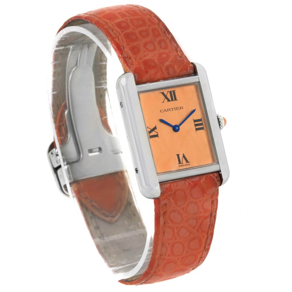 The image shows the Cartier Tank Solo W1019455 Women's Stainless Steel Orange Dial W1019455 Women's Stainless Steel Orange Dial watch at a three-quarter angle, highlighting its rectangular face and orange leather strap.
