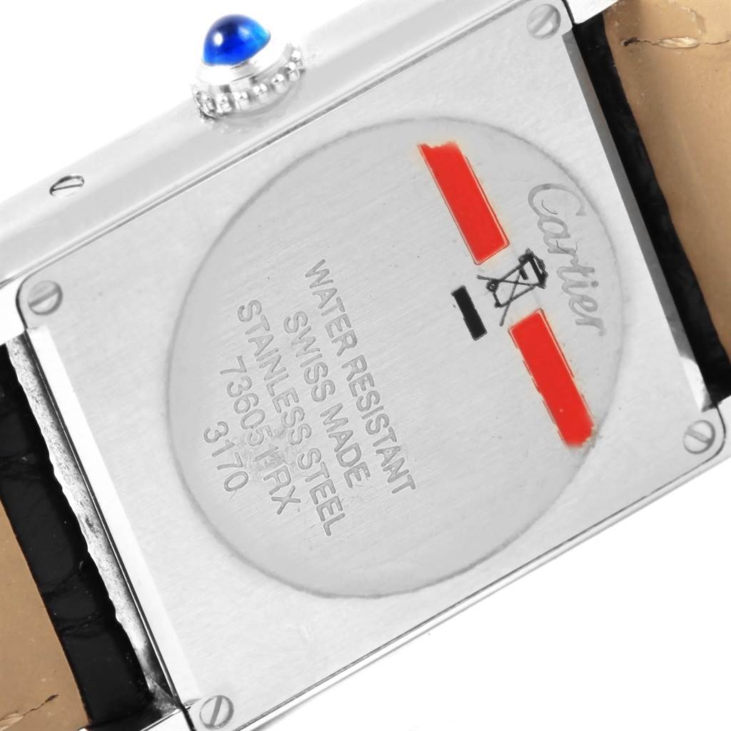 This image shows the back of a Cartier Tank Solo W1018255 Women's Stainless Steel Silver Dial W1018255 Women's Stainless Steel Silver Dial watch, highlighting its casing, screws, and markings.