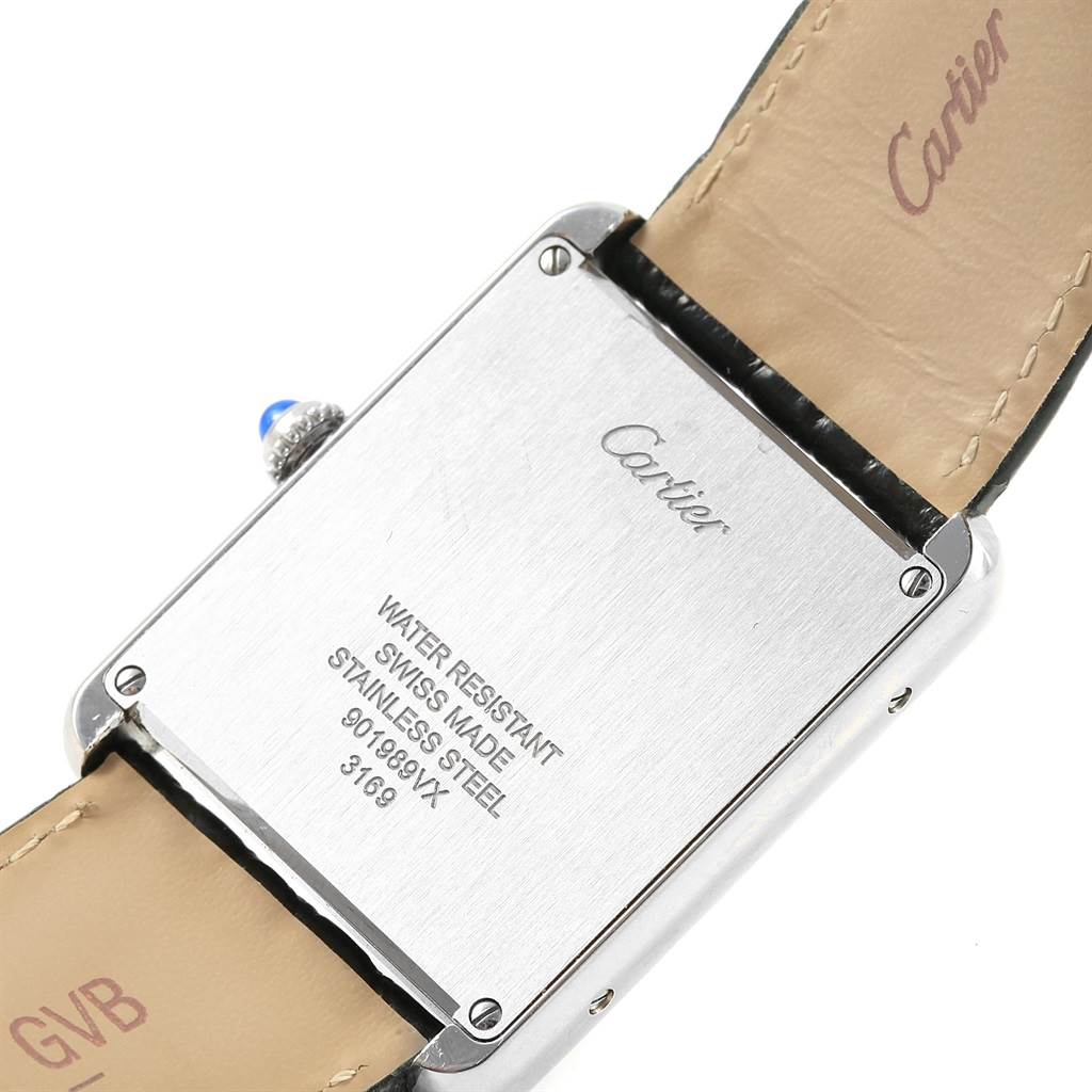 The image shows the back of a Cartier Tank Solo W1018355 Stainless Steel Silver Dial W1018355 Stainless Steel Silver Dial watch, including its stainless steel case and leather strap.