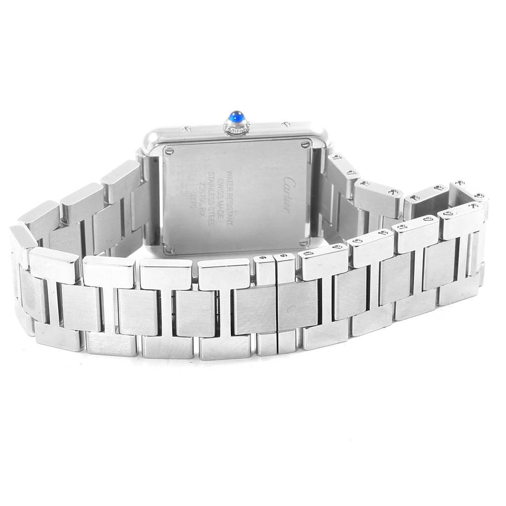 The image shows the back and band of the Cartier Tank Solo W5200013 Women's Stainless Steel Silver Dial W5200013 Women's Stainless Steel Silver Dial watch at an angle with visible inscriptions on the case back.