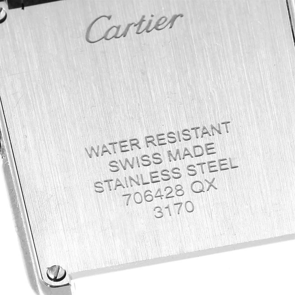 This image shows the engraved backplate of a Cartier Tank Solo W5200013 Women's Stainless Steel Silver Dial W5200013 Women's Stainless Steel Silver Dial watch, highlighting water resistance and material details.