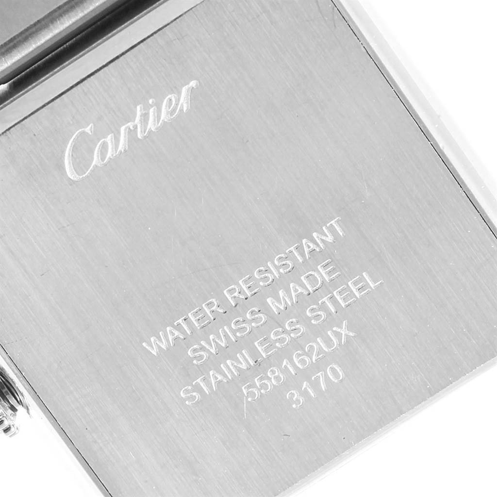 The image shows the engraved case back of the Cartier Tank Solo W5200013 Women
s Stainless Steel Silver Dial W5200013 Women
s Stainless Steel Silver Dial watch, detailing its water resistance, Swiss origin, and materials.