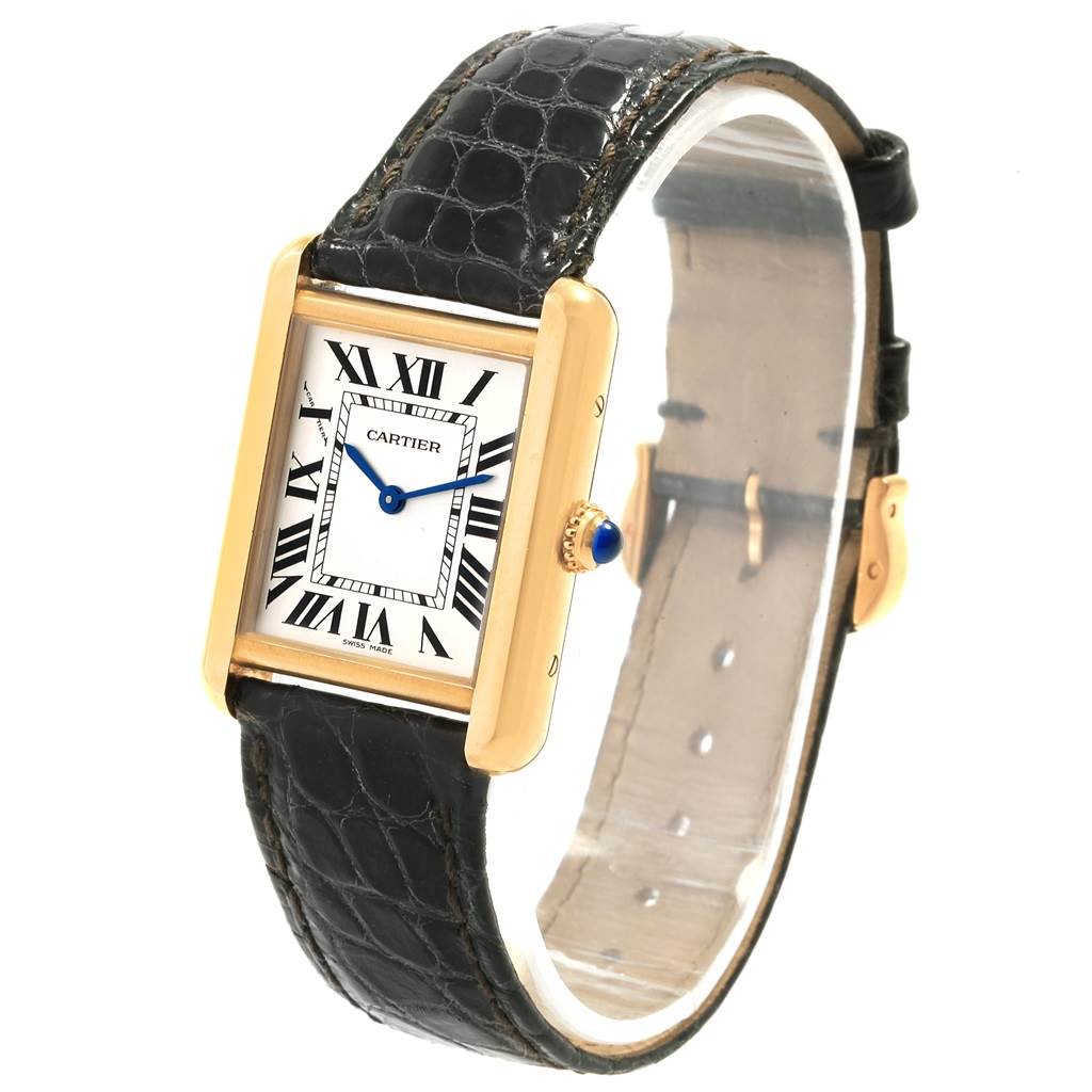 The image shows a Cartier Tank Solo W1018755 Women's Steel and Gold (two tone) Silver Dial W1018755 Women's Steel and Gold (two tone) Silver Dial watch with a rectangular gold case, black leather strap, and white dial viewed from a front angle.