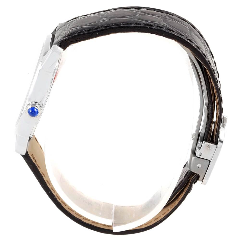 The image shows a side view of the Cartier Tank Solo W6700155 Women
s Stainless Steel Silver Dial W6700155 Women
s Stainless Steel Silver Dial watch, primarily highlighting its strap and the crown.