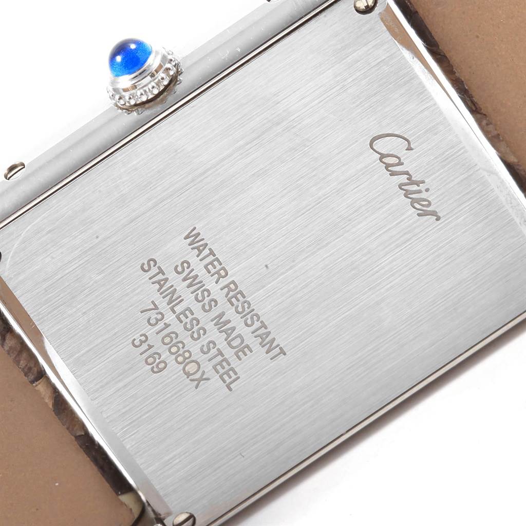 This image shows the back case of a Cartier Tank Solo W5200020 Women's Stainless Steel Blue Dial W5200020 Women's Stainless Steel Blue Dial watch, including the model details and the blue cabochon on the crown.