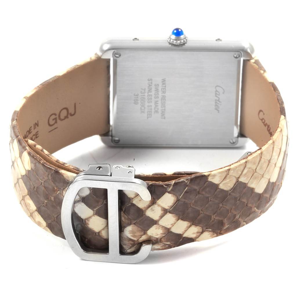 The image shows the back view of a Cartier Tank Solo W5200020 Women's Stainless Steel Blue Dial W5200020 Women's Stainless Steel Blue Dial watch and its clasped leather strap.