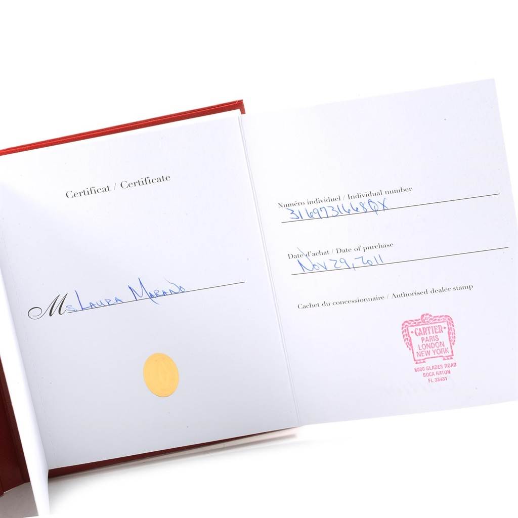 This image shows the certificate and authenticity papers for a Cartier Tank Solo W5200020 Women's Stainless Steel Blue Dial W5200020 Women's Stainless Steel Blue Dial watch.