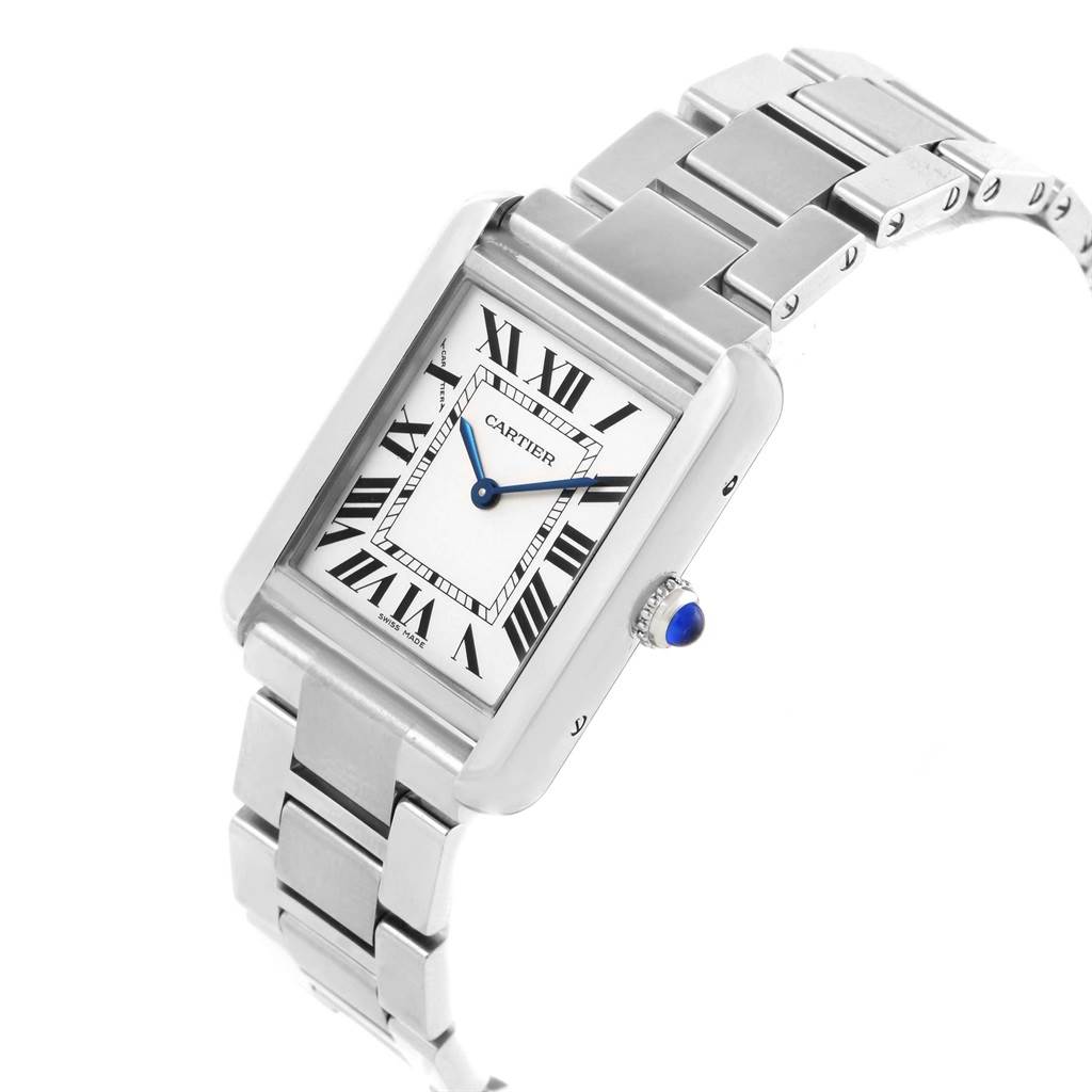 This image shows a Cartier Tank Solo W5200013 Women's Stainless Steel Silver Dial W5200013 Women's Stainless Steel Silver Dial watch from a diagonal front angle, displaying the face, bezel, bracelet, and crown with a blue cabochon.