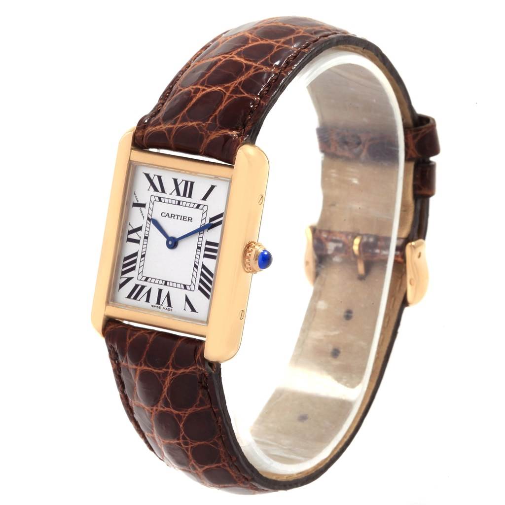 The Cartier Tank Solo W1018755 Women's Steel and Gold (two tone) Silver Dial W1018755 Women's Steel and Gold (two tone) Silver Dial watch is shown at an angled side perspective, displaying the face, crown, and leather strap.