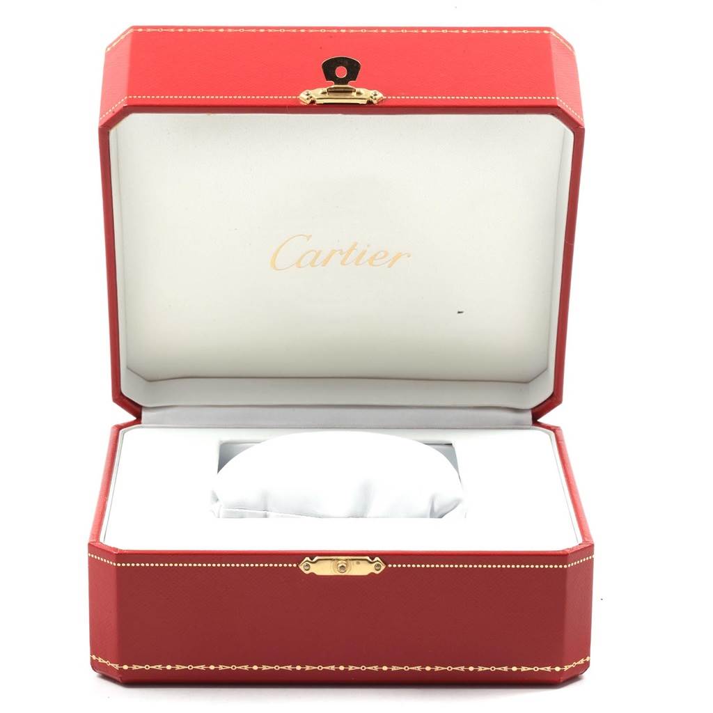 The image shows an open Cartier Tank Solo W1018755 Women's Steel and Gold (two tone) Silver Dial W1018755 Women's Steel and Gold (two tone) Silver Dial watch box with a red exterior and white interior padding.