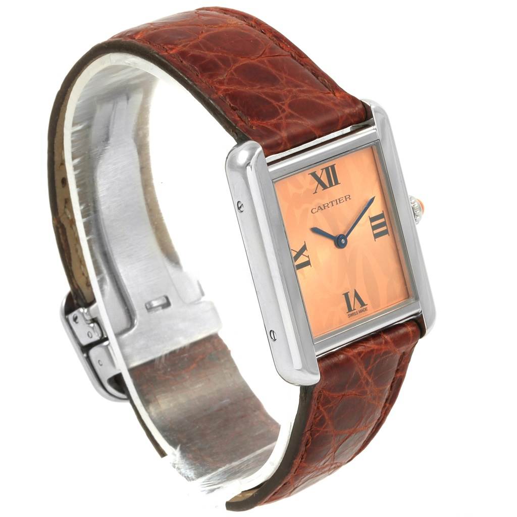 This image shows a Cartier Tank Solo W1019455 Women's Stainless Steel Orange Dial W1019455 Women's Stainless Steel Orange Dial watch, angled to display its face, bezel, crown, and leather strap.