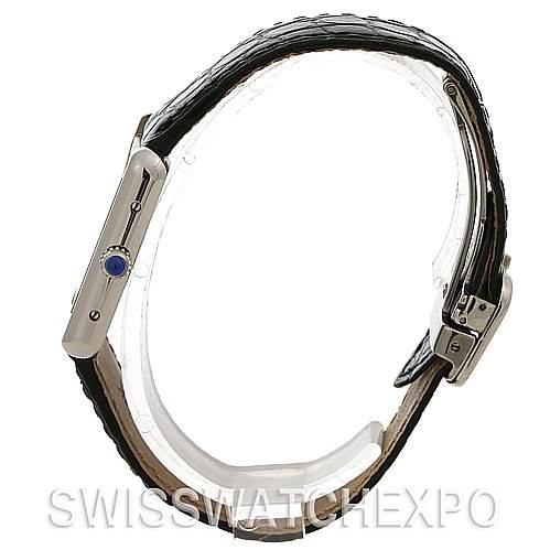 The image shows a Cartier Tank Solo W5200005 Women
s Stainless Steel Silver Dial W5200005 Women
s Stainless Steel Silver Dial watch from a side profile, highlighting the crown and strap.