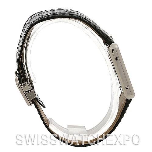 The image shows a side profile angle of a Tank Solo model by Cartier, highlighting the strap and a partial view of the rectangular case.