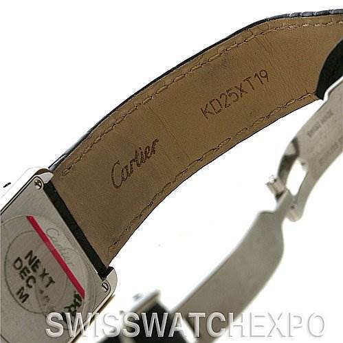 The image shows the underside of the strap and clasp of a Cartier Tank Solo W5200005 Women
s Stainless Steel Silver Dial W5200005 Women
s Stainless Steel Silver Dial watch, highlighting engravings and markings.