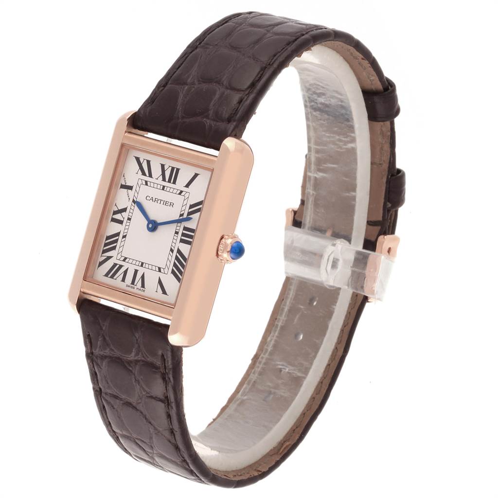 The image shows a Cartier Tank Solo W5200024 Women's Steel and Gold (two tone) Silver Dial W5200024 Women's Steel and Gold (two tone) Silver Dial watch with a rectangular case, a white dial with Roman numerals, and a black leather strap.