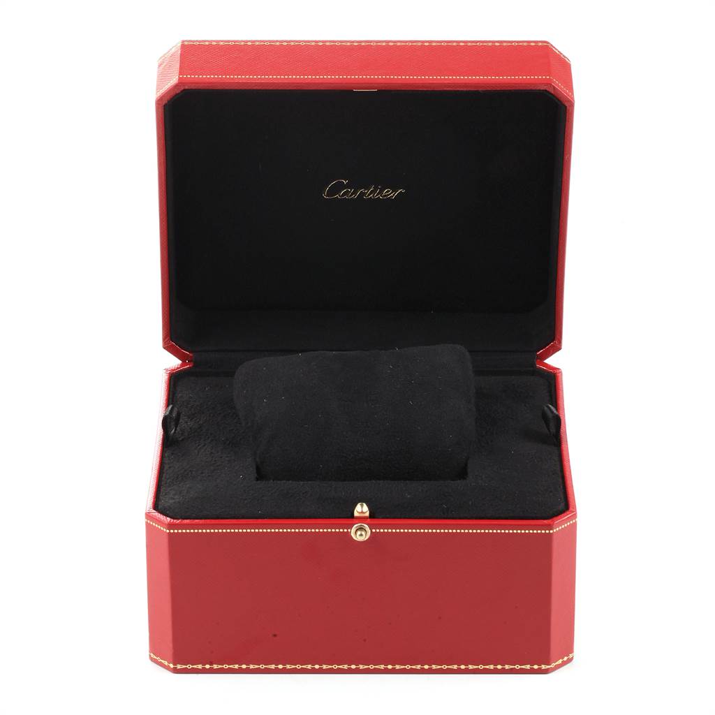 The image shows an empty red and black Cartier watch box open, designed for the Tank Solo model.