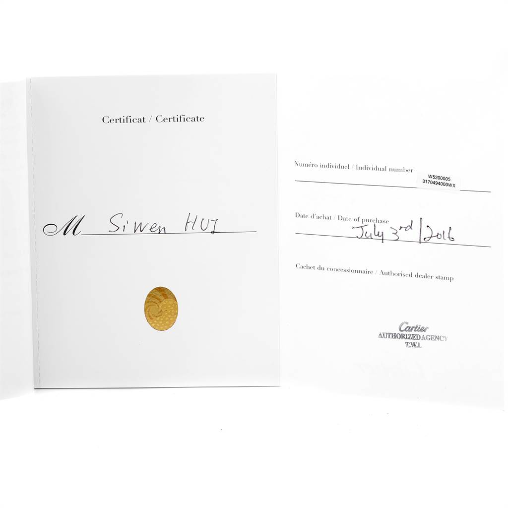 The image shows a certificate for a Tank Solo model watch by Cartier, including purchase details and an authorized dealer stamp.