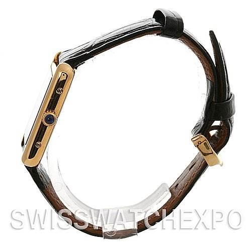 The image shows a side view of a Cartier Tank Solo W1018755 Women's Yellow Gold Silver Dial W1018755 Women's Yellow Gold Silver Dial watch, highlighting the case, crown, and leather strap.