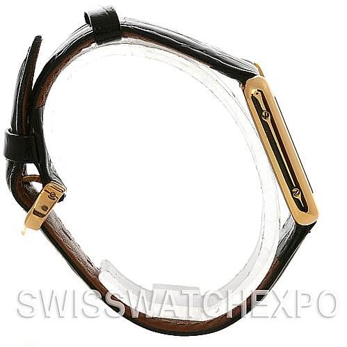 The image shows a Cartier Tank Solo W1018755 Women's Yellow Gold Silver Dial W1018755 Women's Yellow Gold Silver Dial watch from the side, highlighting its case, strap, and buckle.