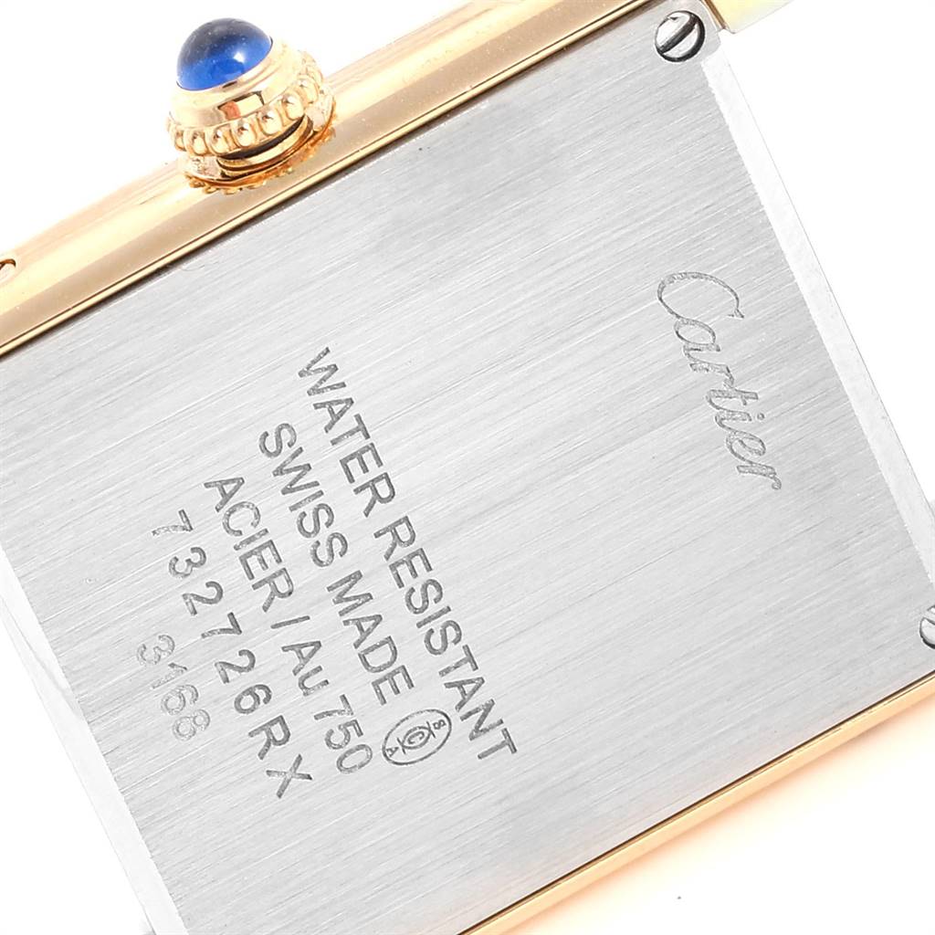 The image shows the back of a Cartier Tank Solo W1018755 Women
s Steel and Gold (two tone) Silver Dial W1018755 Women
s Steel and Gold (two tone) Silver Dial watch, detailing its water resistance, Swiss make, and other specifications.